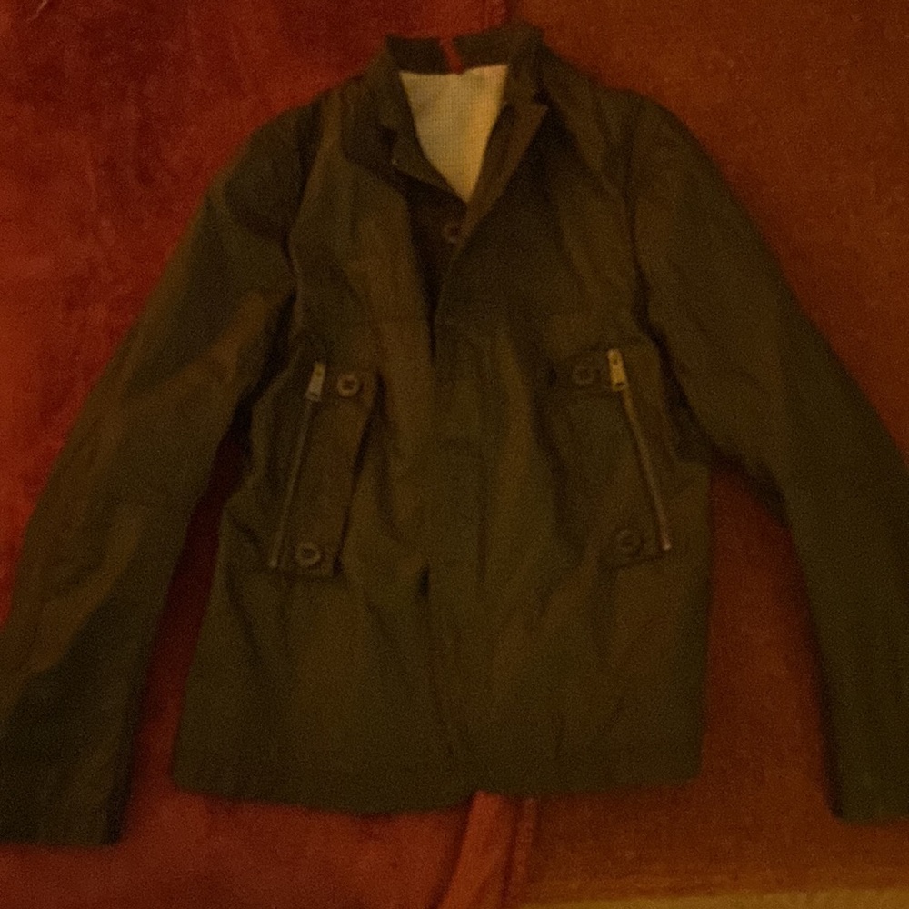 Waxed rain coat from j lindeberg. Size small and fits/tailored amazingly.